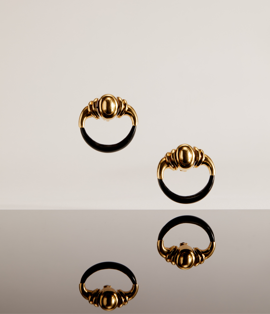 Aldo Cipullo for Cartier Onyx Door Knocker Ear Clips in 18k Gold